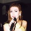 Nawal El Zoghby singing on stage 8