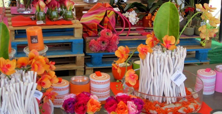 Colorful scented candles and artificial flowers at Garden Show Beirut