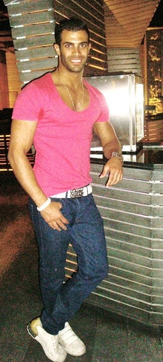 Tarek Naguib hot photo in pink t shirt and casual jeans