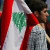 Young Man Holding Lebanon Flag